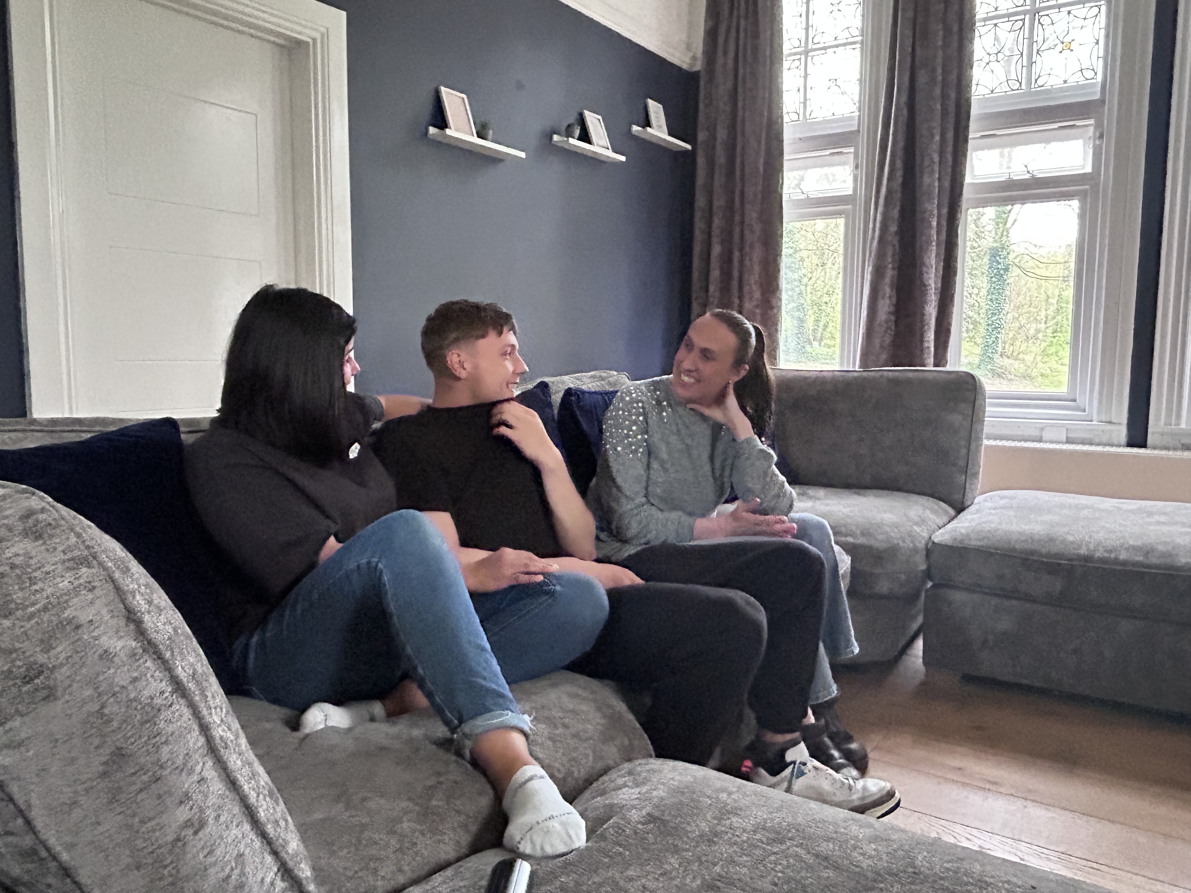 Staff chat with one of the residents at a children's home in Leicester 