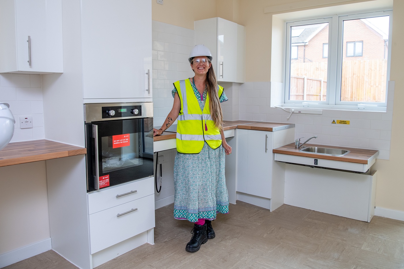 Cllr Cutkelvin at one of the new bungalows